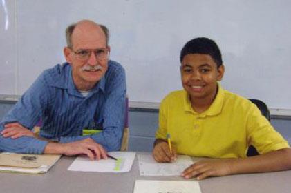 Volunteer tutor and student 